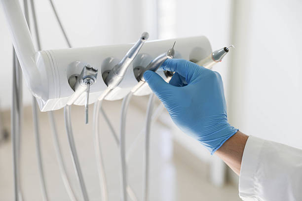Professional Tooth Extraction technician working in Fox Island, WA